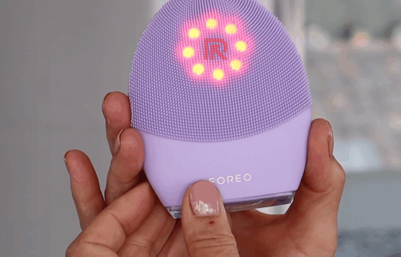 Foreo Luna 4 with its app showing skincare routine Foreo Luna 4 device next to skincare essentials